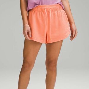 Lululemon inner glow high-rise 3” short. Sunny coral
Size 4.